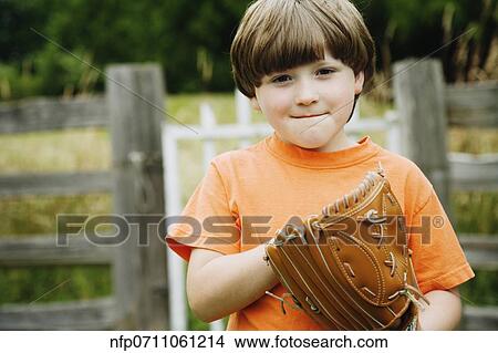 Picture - Boy wearing baseball glove. Fotosearch