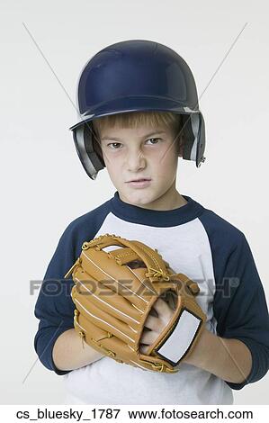 Boy wearing baseball outfit View Large Photo Image Stock Photo - Boy wearing baseball outfit. Fotosearch