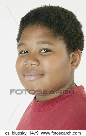 Stock Photo - Close up of African boy. Fotosearch