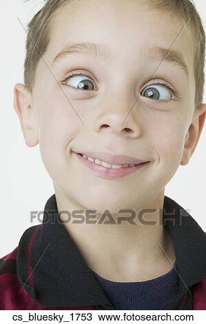 Close up of boy crossing eyes View Large Photo Image Stock Image - Close up of boy crossing eyes. Fotosearch