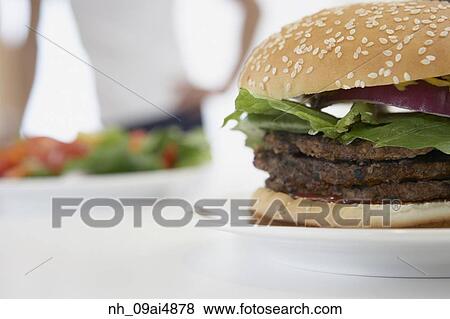 Close up of hamburger View Large Photo Image Stock Photo - Close up of hamburger. Fotosearch