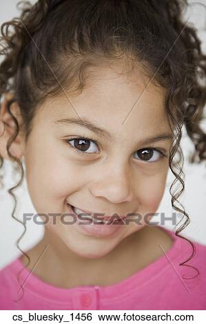 Stock Photograph - Close up of Hispanic girl. Fotosearch