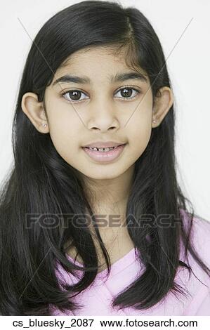 Stock Photo - Close up of Indian girl smiling. Fotosearch
