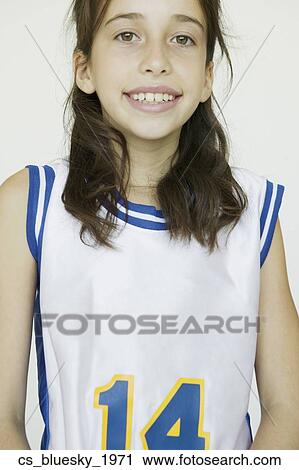 Stock Image - Girl wearing sports uniform. Fotosearch