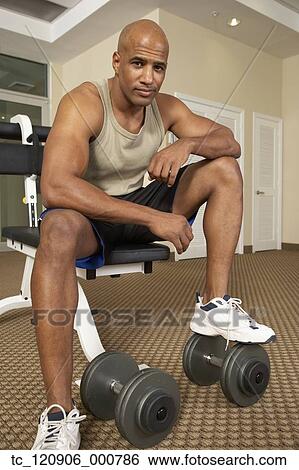 Mixed Race man at health club View Large Photo Image Stock Photograph - Mixed Race man at health club. Fotosearch