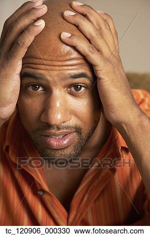 Mixed Race man with hands on head View Large Photo Image Stock Image - Mixed Race man with hands on head. Fotosearch