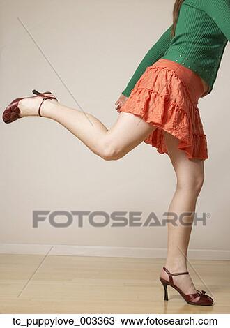 Mixed Race woman wearing mini skirt and high heels View Large Photo Image Stock Image - Mixed Race woman wearing mini skirt and high heels. Fotosearch