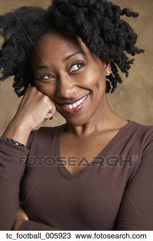 Stock Image - Portrait of African woman. Fotosearch