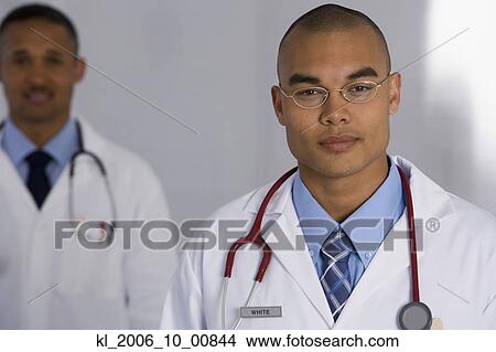 Portrait of multi-ethnic doctors View Large Photo Image Picture - Portrait of multi-ethnic doctors. Fotosearch