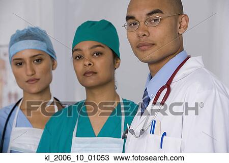 Stock Image - Portrait of multi-ethnic doctors. Fotosearch