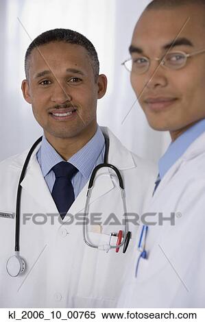 Stock Photography - Portrait of multi-ethnic doctors. Fotosearch
