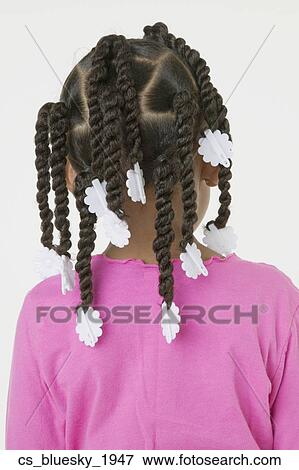 Stock Photo - Rear view of African girl. Fotosearch