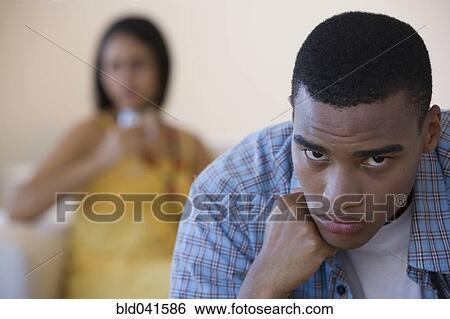 Stock Photograph - African man looking angry. Fotosearch