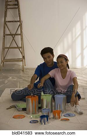 Asian couple with painting supplies View Large Photo Image Stock Image - Asian couple with painting supplies. Fotosearch