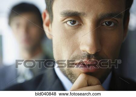 Close up of South American businessman View Large Photo Image Stock Photo - Close up of South American businessman. Fotosearch