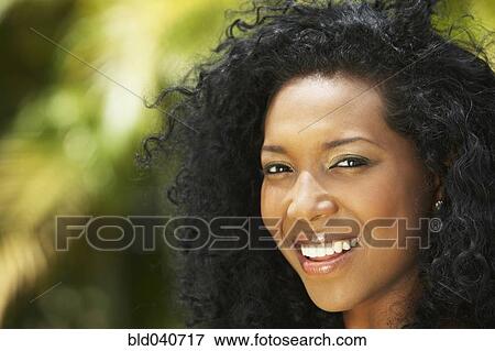 Stock Photo - Close up of South American woman smiling. Fotosearch