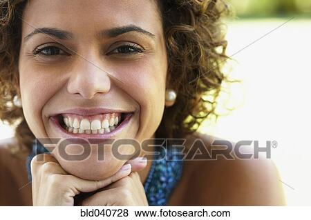Stock Photo - Close up of South American woman smiling. Fotosearch