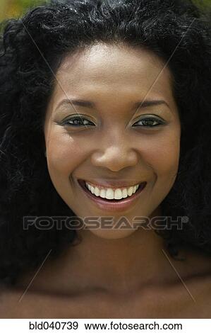 Stock Photo - Close up of South American woman smiling. Fotosearch