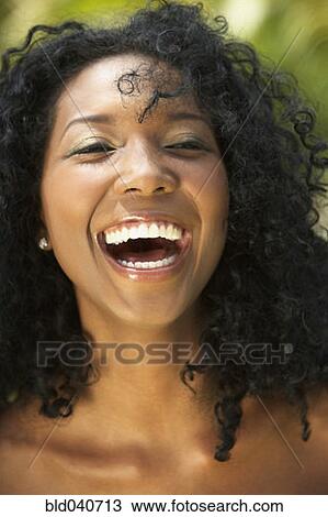 Close up of South American woman laughing View Large Photo Image Stock Image - Close up of South American woman laughing. Fotosearch