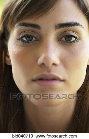 Stock Photo - Close up of South American woman’s face. Fotosearch