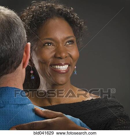 Multi-ethnic couple dancing View Large Photo Image Stock Photo - Multi-ethnic couple dancing. Fotosearch