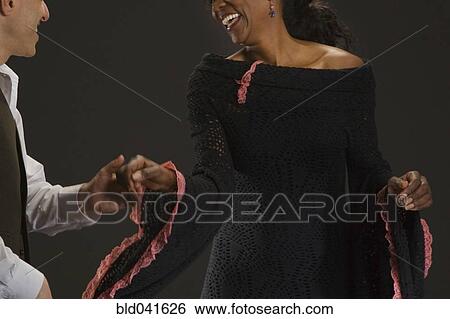 Multi-ethnic couple dancing View Large Photo Image Stock Photograph - Multi-ethnic couple dancing. Fotosearch