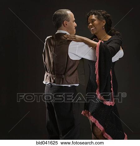 Multi-ethnic couple dancing View Large Photo Image Stock Photography - Multi-ethnic couple dancing. Fotosearch