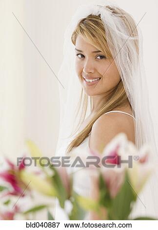 Stock Photo - Portrait of Hispanic bride. Fotosearch