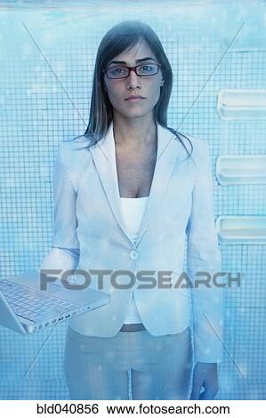 Stock Photograph - South American businesswoman in swimming pool. Fotosearch