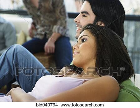 Picture - South American couple at party. Fotosearch