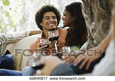Stock Photo - South American couple at party. Fotosearch