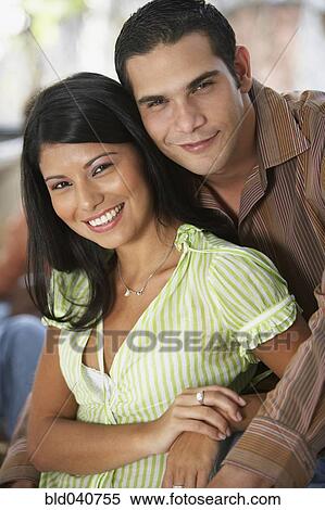South American couple hugging View Large Photo Image Stock Photography - South American couple hugging. Fotosearch