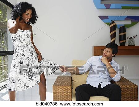 South American man grabbing girlfriend’s skirt View Large Photo Image Stock Photograph - South American man grabbing girlfriend’s skirt. Fotosearch