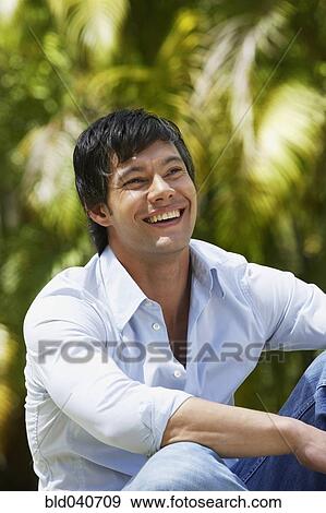 Stock Photo - South American man laughing. Fotosearch