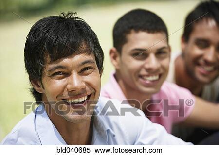 Stock Photography - South American men laughing. Fotosearch
