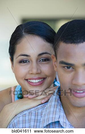 Woman leaning on boyfriend’s shoulder View Large Photo Image Stock Image - Woman leaning on boyfriend’s shoulder. Fotosearch