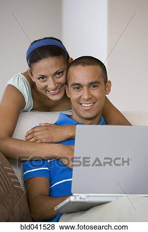 Young couple hugging View Large Photo Image Stock Photo - Young couple hugging. Fotosearch