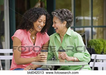 African American mother and adult daughter laughing View Large Photo Image Stock Image - African American mother and adult daughter laughing. Fotosearch