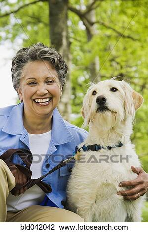 African American woman hugging dog View Large Photo Image Stock Image - African American woman hugging dog. Fotosearch