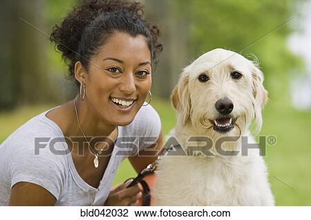 African American woman with dog View Large Photo Image Stock Image - African American woman with dog. Fotosearch