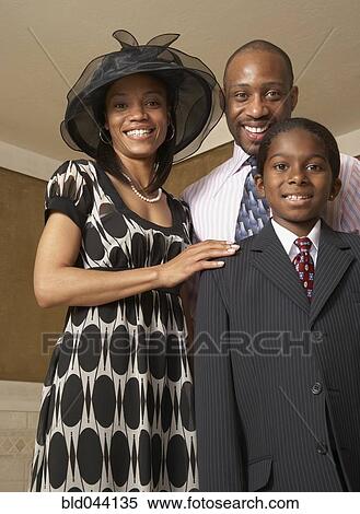 Stock Photography - African family dressed for church. Fotosearch