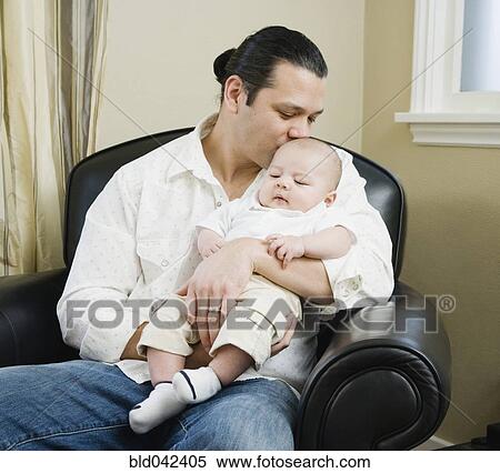 Asian father holding baby View Large Photo Image Stock Photography - Asian father holding baby. Fotosearch