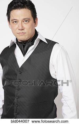 Stock Photo - Asian man in tango outfit. Fotosearch