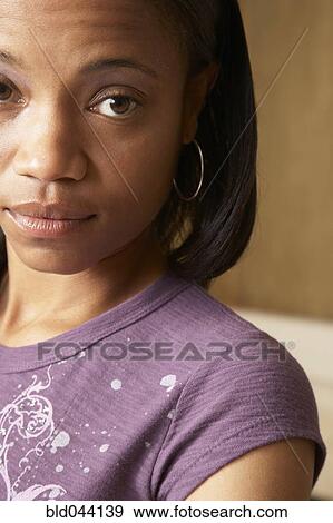 Stock Photo - Close up of African American woman. Fotosearch