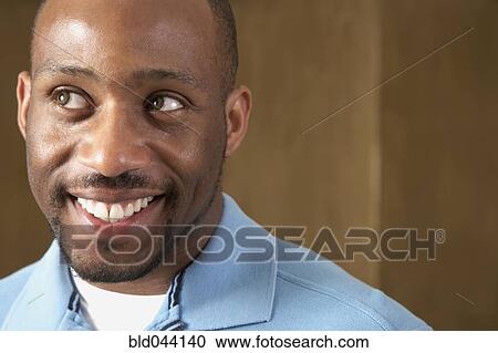 Close up of African man smiling View Large Photo Image Stock Image - Close up of African man smiling. Fotosearch