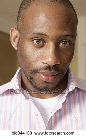 Close up of African man View Large Photo Image Stock Photo - Close up of African man. Fotosearch