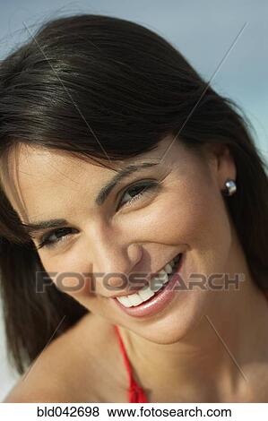 Stock Photo - Close up of South American woman smiling. Fotosearch