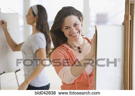 Female college students in art class View Large Photo Image Stock Photo - Female college students in art class. Fotosearch