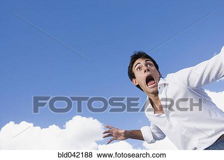 Frightened man yelling View Large Photo Image Stock Photo - Frightened man yelling. Fotosearch