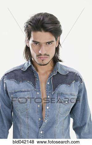 Hispanic man wearing western shirt View Large Photo Image Stock Photo - Hispanic man wearing western shirt. Fotosearch